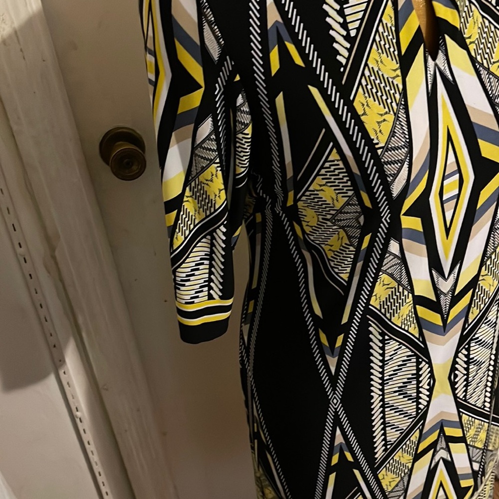 Woman’s beautiful black and yellow dress. Size 8.